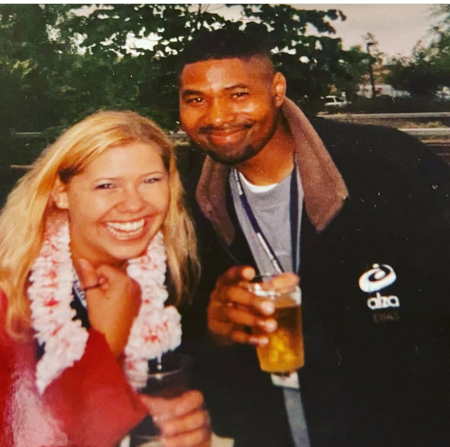 A younger Carrie Phillips smiling with a loved one