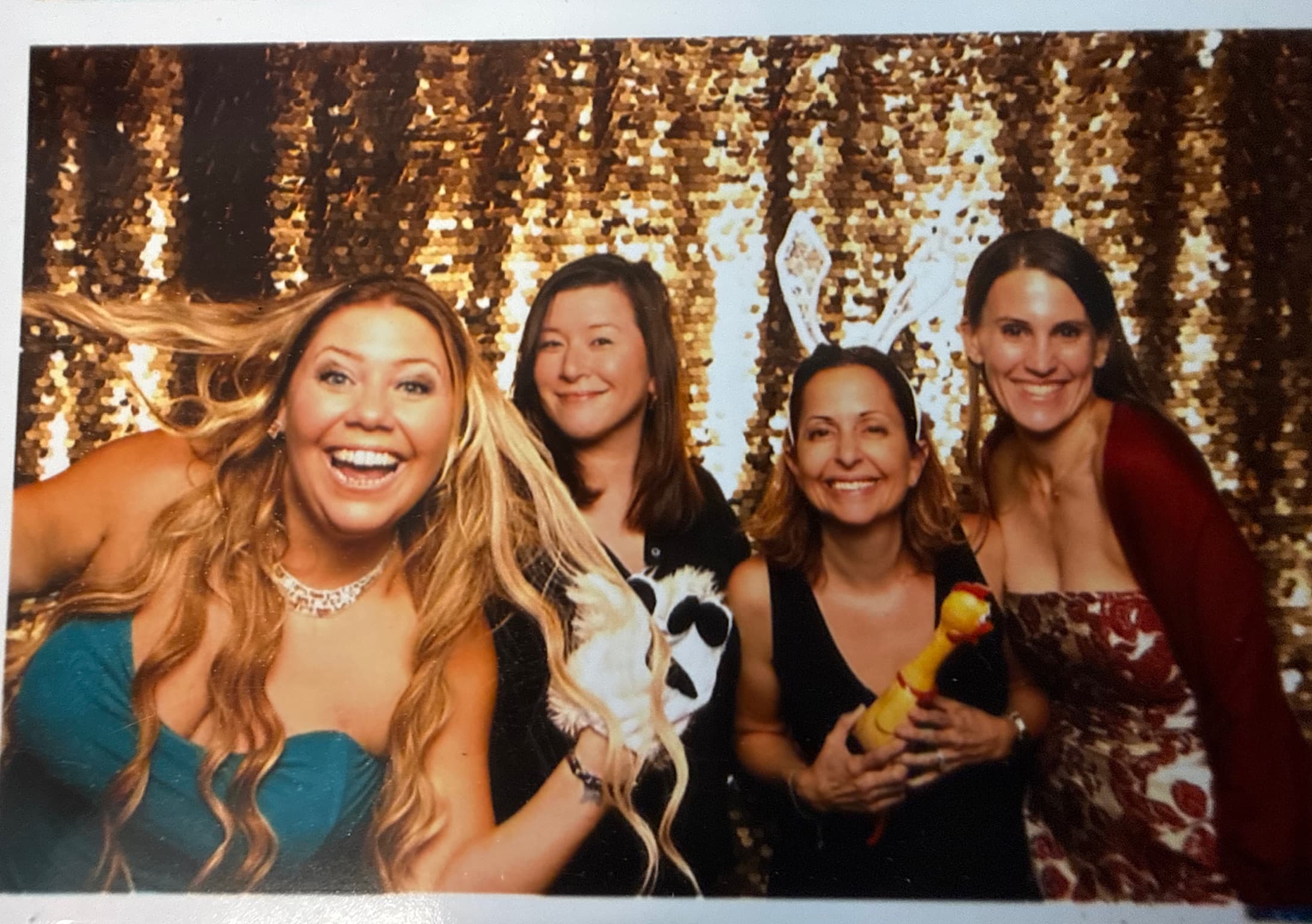 Carrie Phillips smiling with friends at a celebration